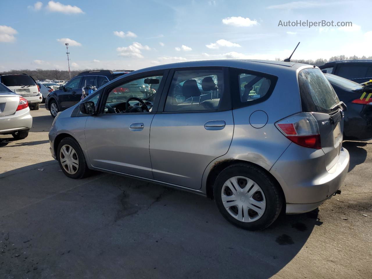 2009 Honda Fit  Silver vin: JHMGE87219S040321