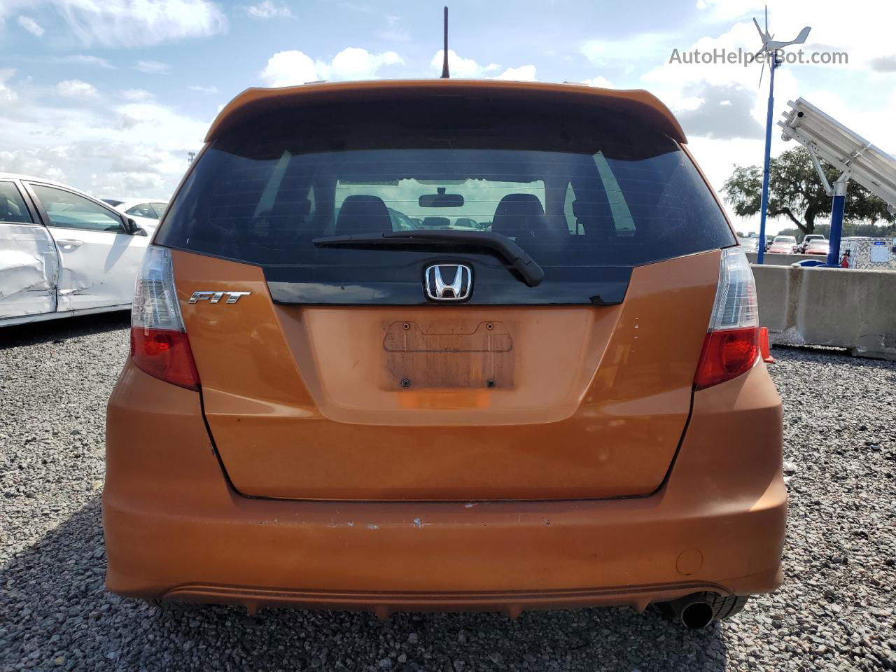 2009 Honda Fit Sport Оранжевый vin: JHMGE87429S016143