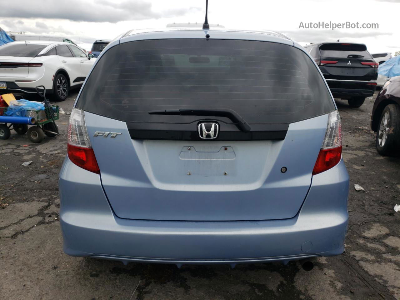 2009 Honda Fit  Синий vin: JHMGE88209C003687