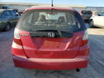 2009 Honda Fit  Красный vin: JHMGE88219C003021