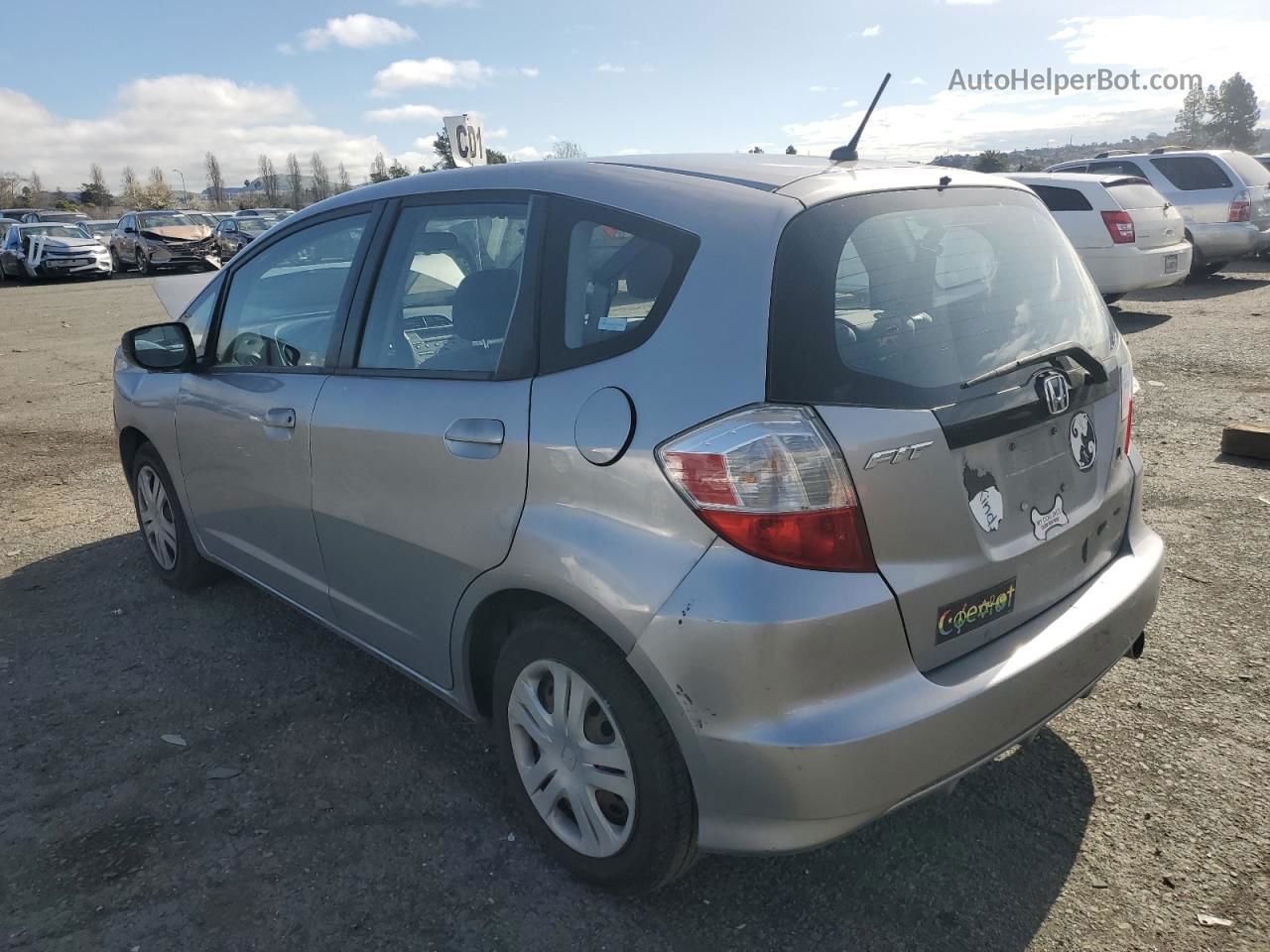 2009 Honda Fit  Silver vin: JHMGE88219S032444