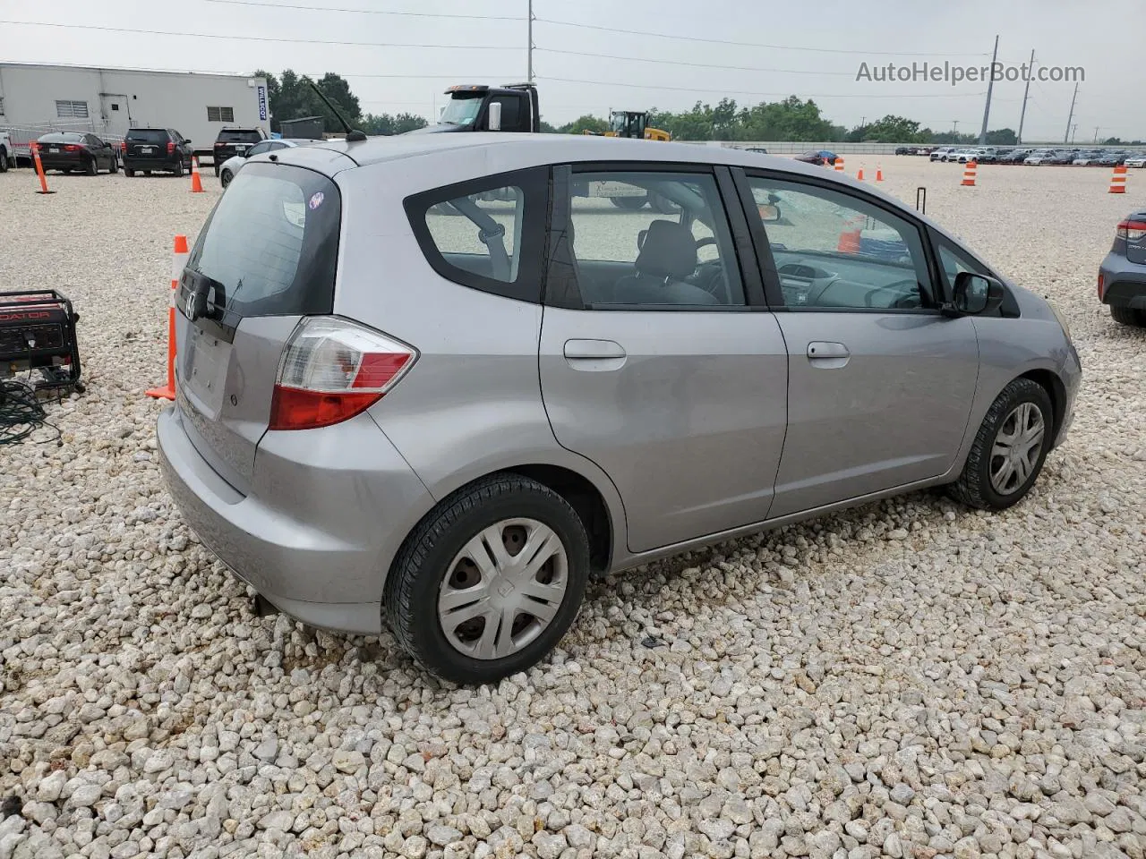 2009 Honda Fit  Silver vin: JHMGE88219S045792