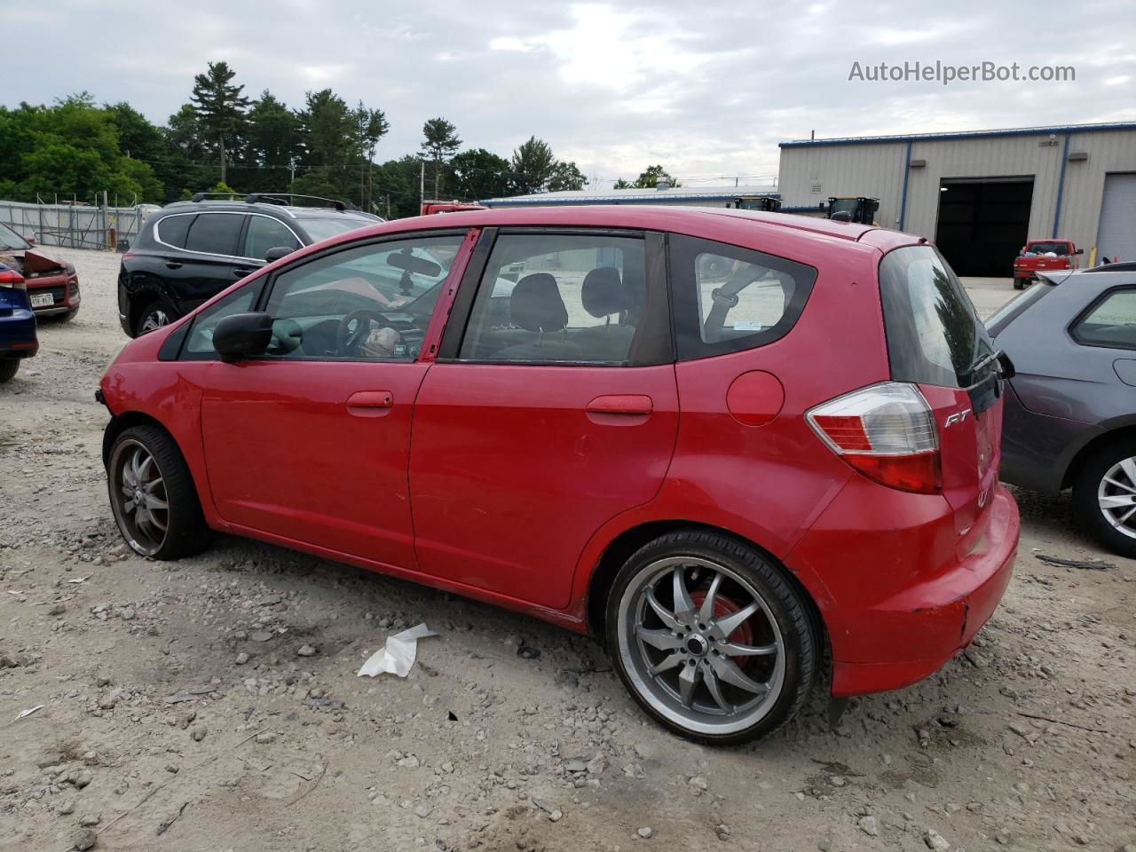 2009 Honda Fit  Red vin: JHMGE88239C002372