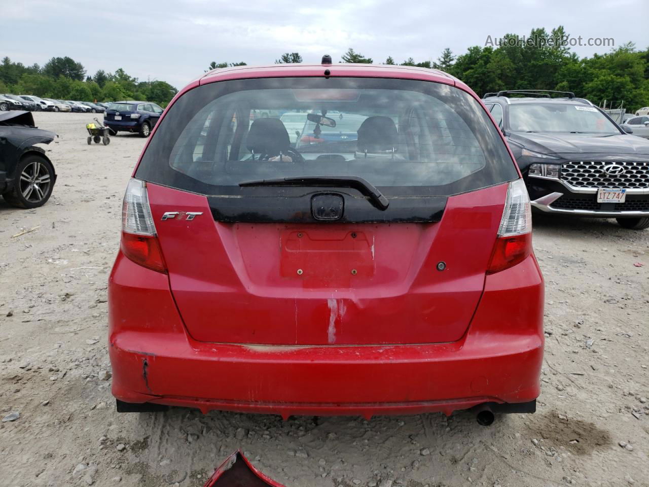 2009 Honda Fit  Red vin: JHMGE88239C002372