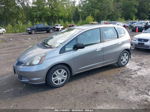 2009 Honda Fit Silver vin: JHMGE88239S000272