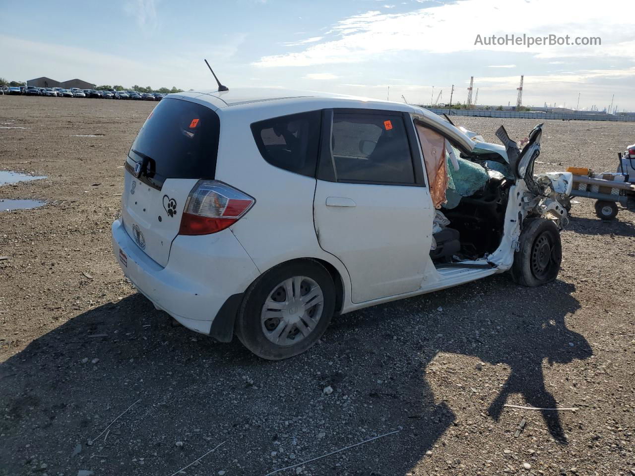 2009 Honda Fit  White vin: JHMGE88249S069889