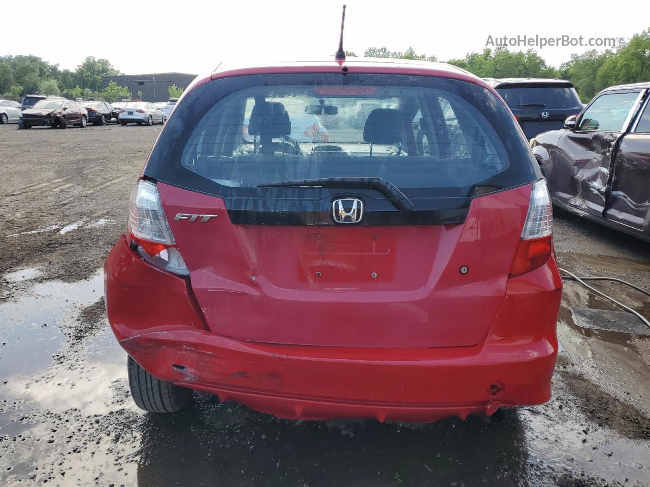 2009 Honda Fit  Красный vin: JHMGE88259S023519