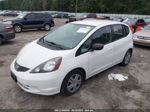 2009 Honda Fit   White vin: JHMGE88269S048378