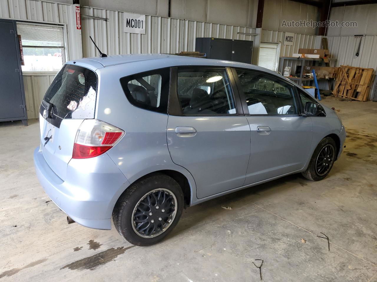 2009 Honda Fit  Blue vin: JHMGE88279S057137