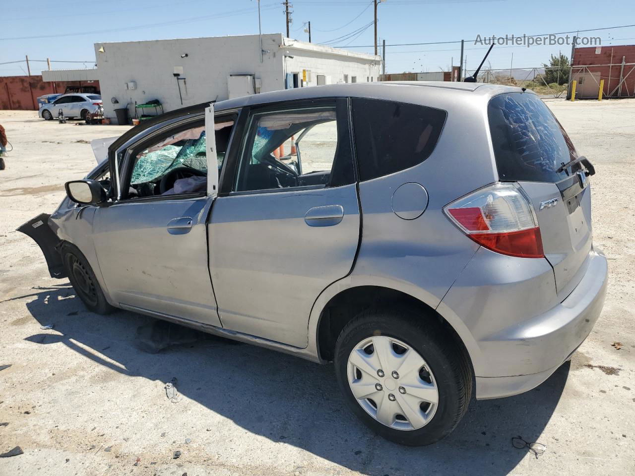 2009 Honda Fit  Silver vin: JHMGE88279S065853