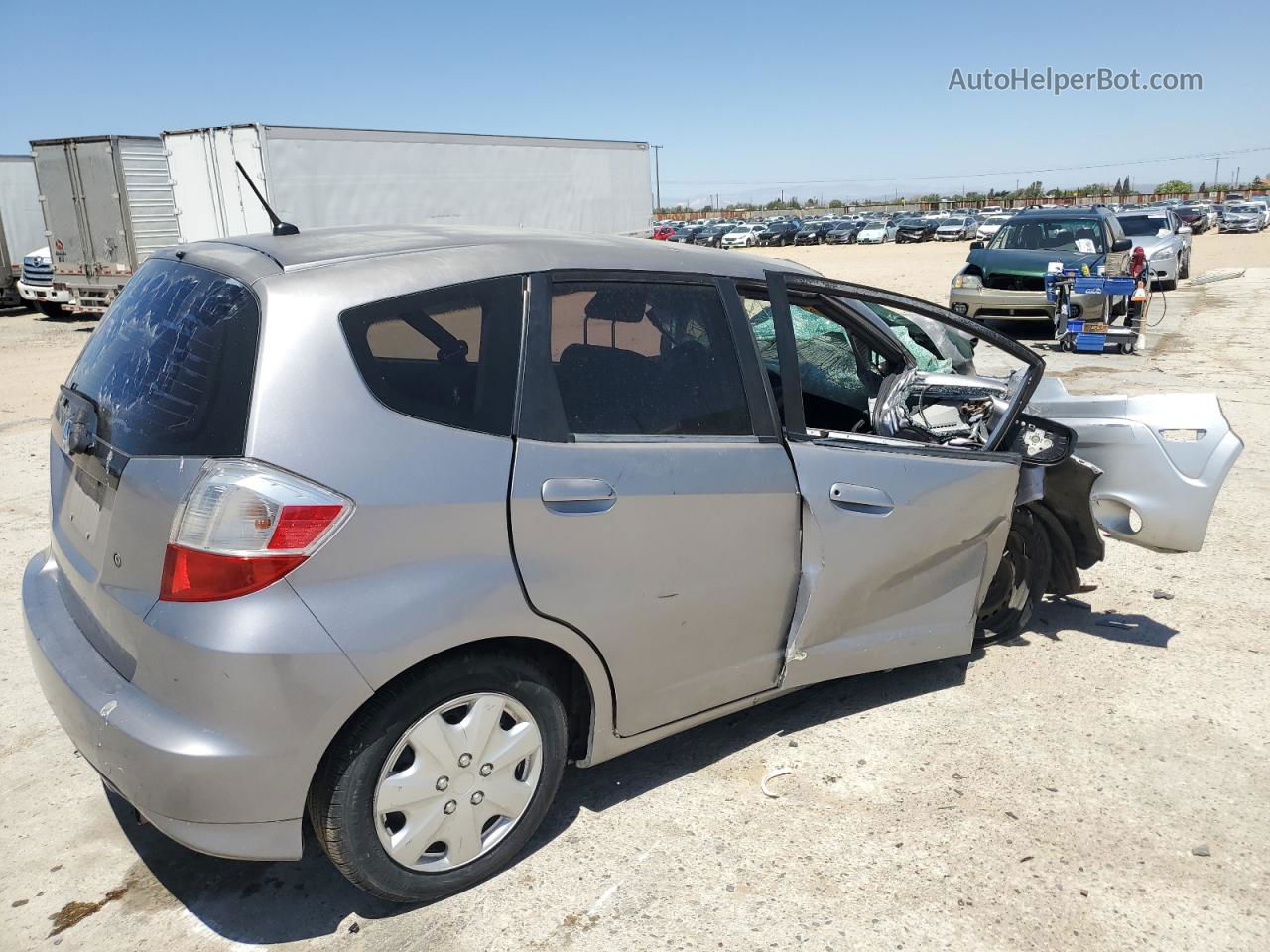 2009 Honda Fit  Silver vin: JHMGE88279S065853