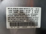 2009 Honda Fit  Gray vin: JHMGE88299S007937