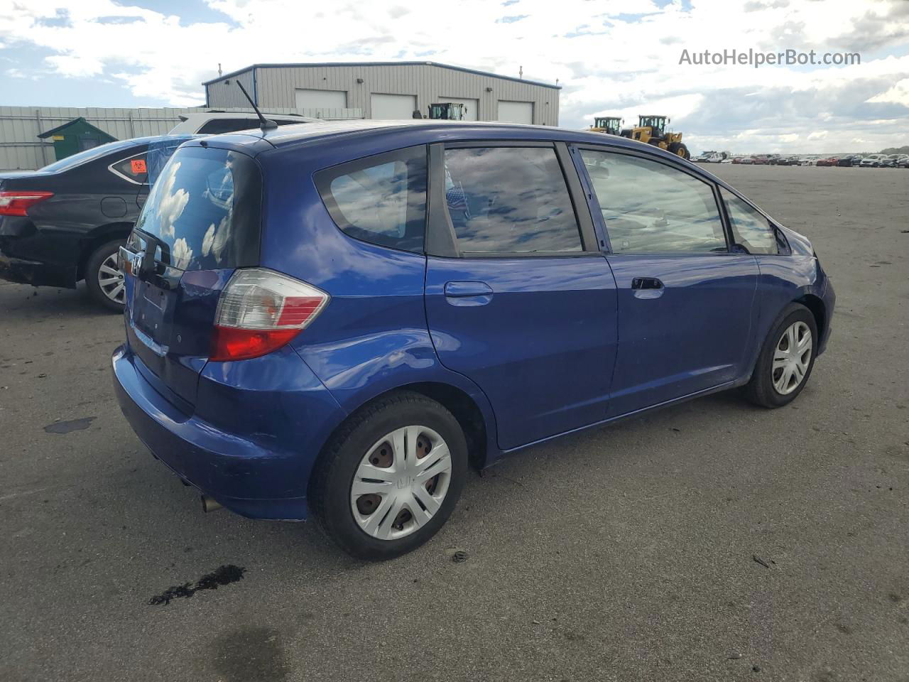 2009 Honda Fit  Синий vin: JHMGE88299S047547