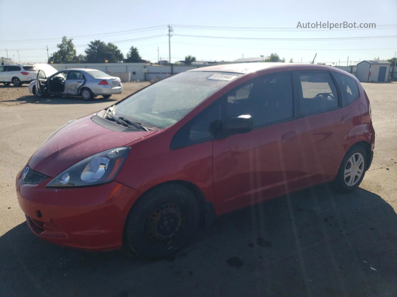 2009 Honda Fit  Red vin: JHMGE88299S051016