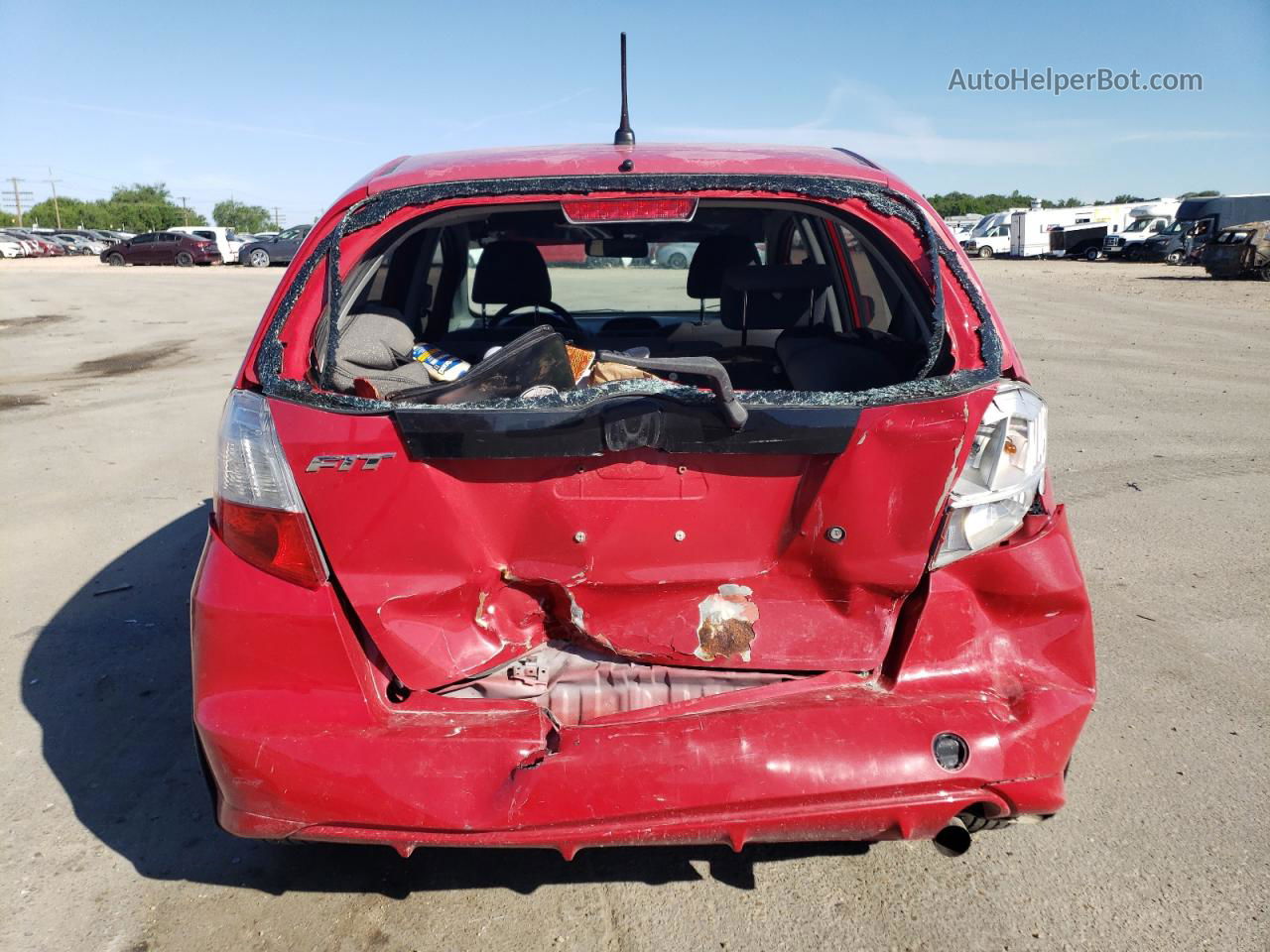 2009 Honda Fit  Red vin: JHMGE88299S051016