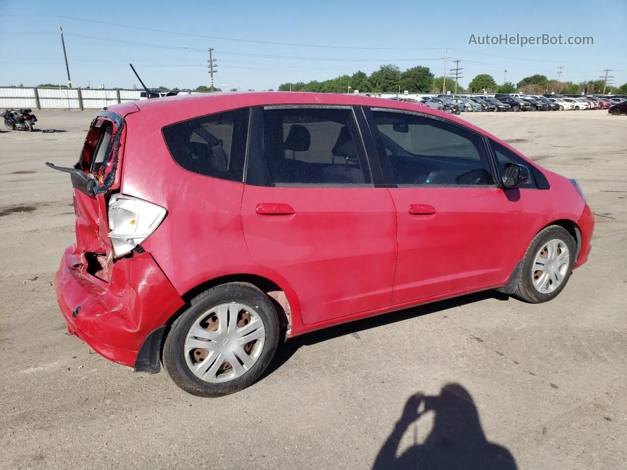 2009 Honda Fit  Red vin: JHMGE88299S051016