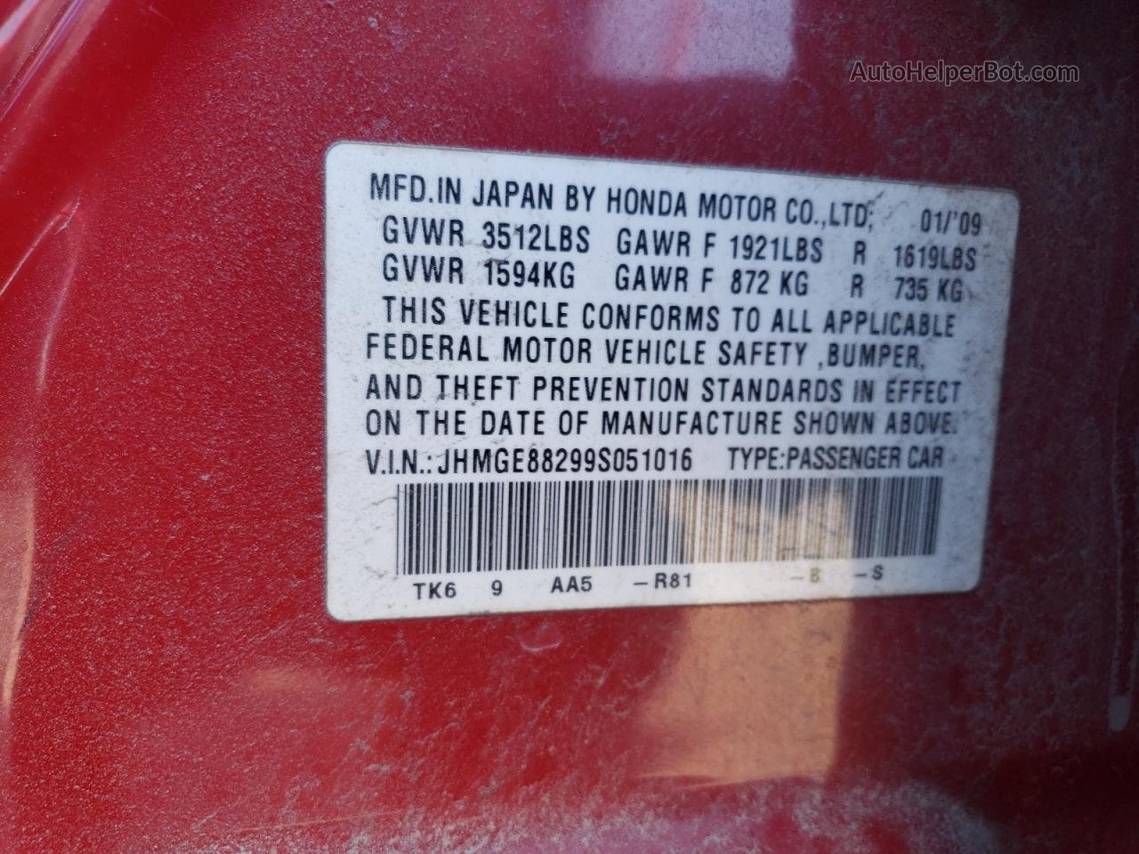 2009 Honda Fit  Red vin: JHMGE88299S051016