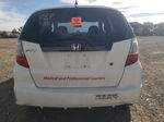 2009 Honda Fit  White vin: JHMGE88299S073310