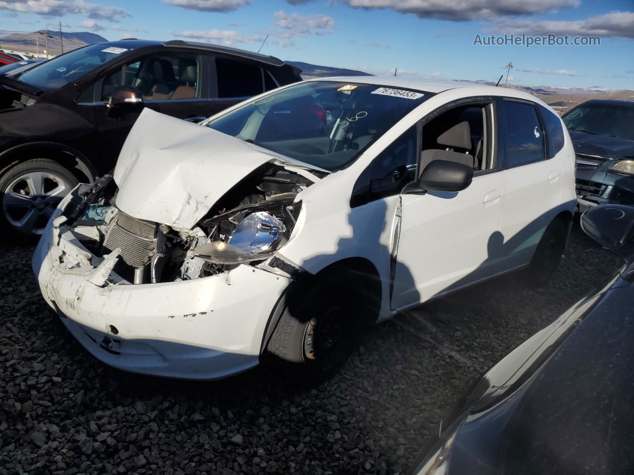 2009 Honda Fit  White vin: JHMGE88299S073310