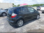 2009 Honda Fit   Black vin: JHMGE882X9C004684