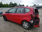 2009 Honda Fit  Red vin: JHMGE882X9C006287