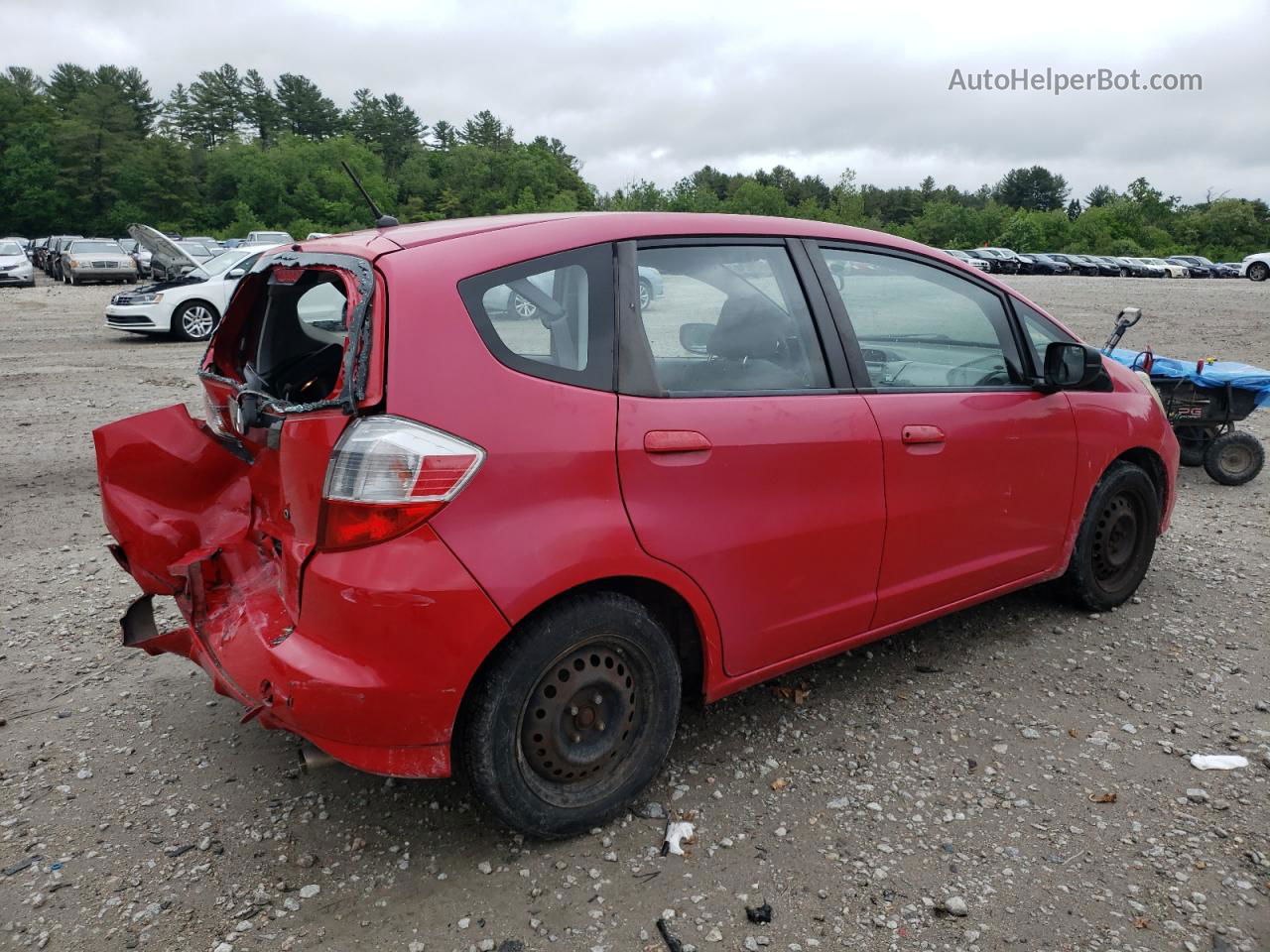 2009 Honda Fit  Red vin: JHMGE882X9C006287