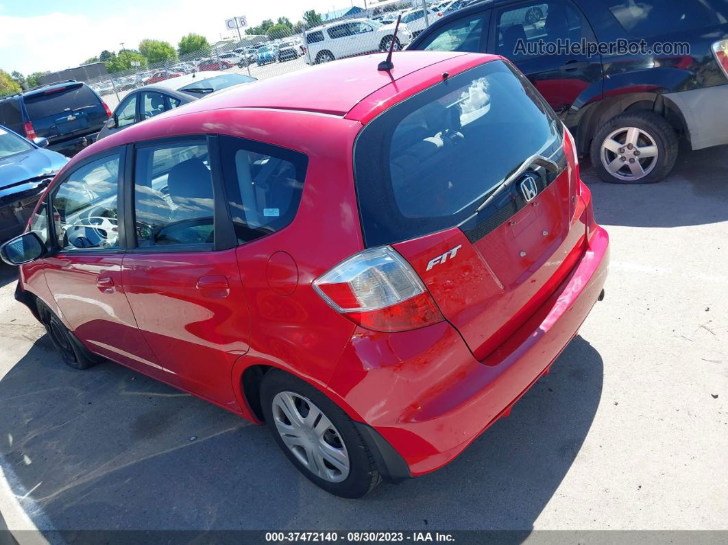 2009 Honda Fit   Red vin: JHMGE882X9S072618