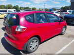 2009 Honda Fit   Red vin: JHMGE882X9S072618