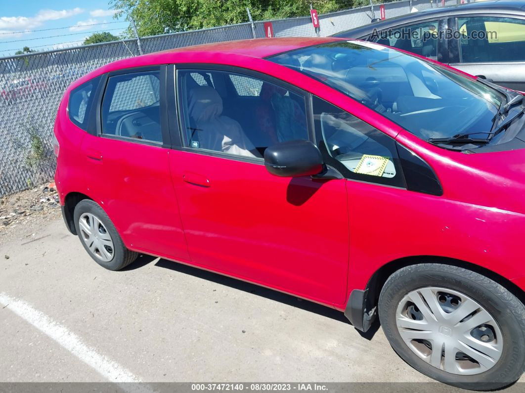 2009 Honda Fit   Red vin: JHMGE882X9S072618