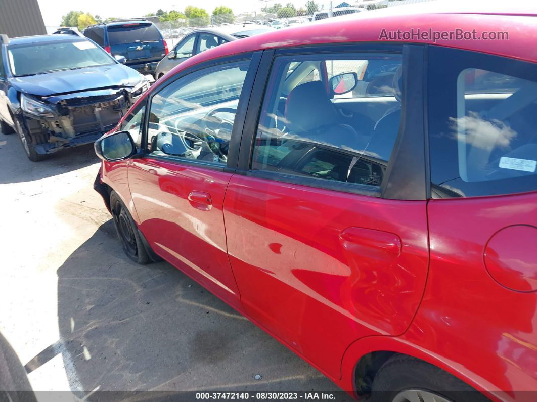 2009 Honda Fit   Red vin: JHMGE882X9S072618