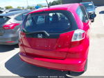 2009 Honda Fit   Red vin: JHMGE882X9S072618