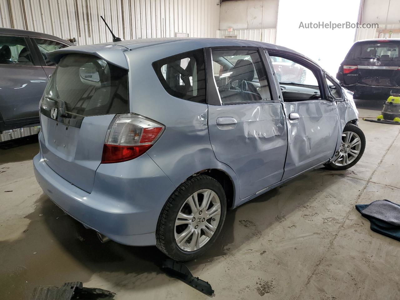 2009 Honda Fit Sport Blue vin: JHMGE88409S048961