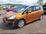 2009 Honda Fit Sport Orange vin: JHMGE88419S044031