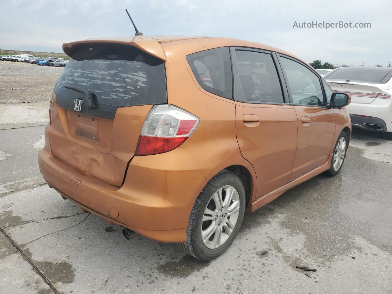 2009 Honda Fit Sport Orange vin: JHMGE88439S004985