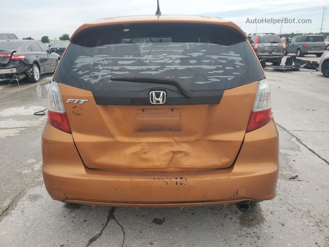 2009 Honda Fit Sport Orange vin: JHMGE88439S004985