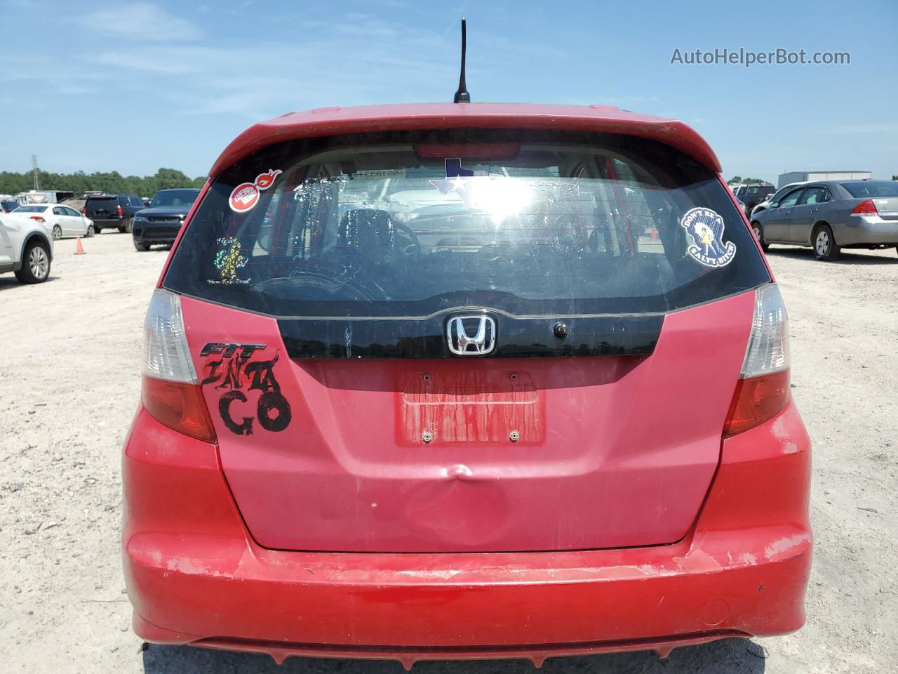 2009 Honda Fit Sport Red vin: JHMGE88449S036439