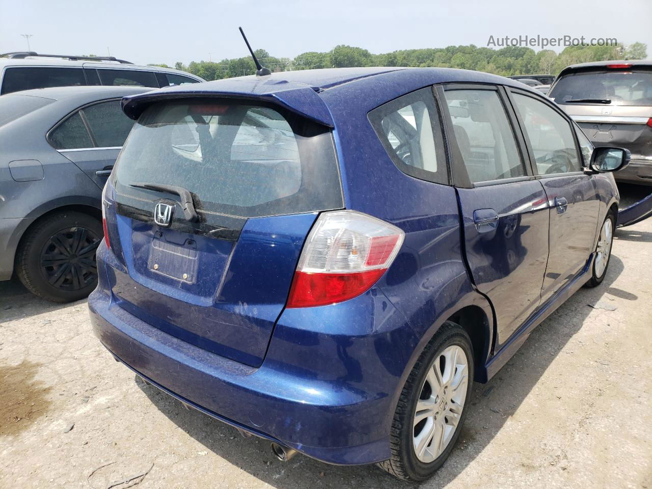 2009 Honda Fit Sport Blue vin: JHMGE88469S013339