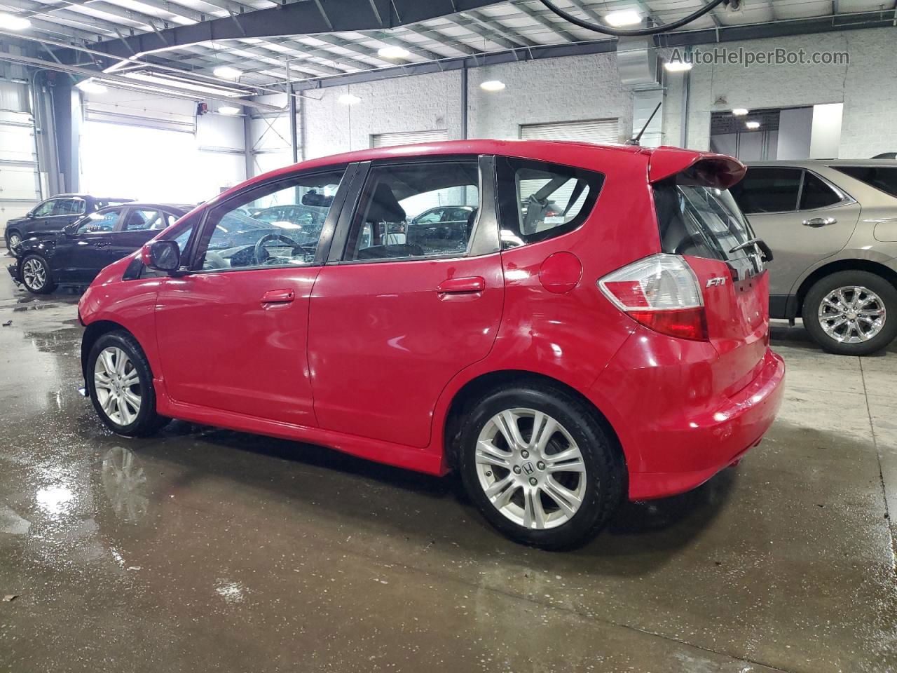 2009 Honda Fit Sport Red vin: JHMGE884X9C000782