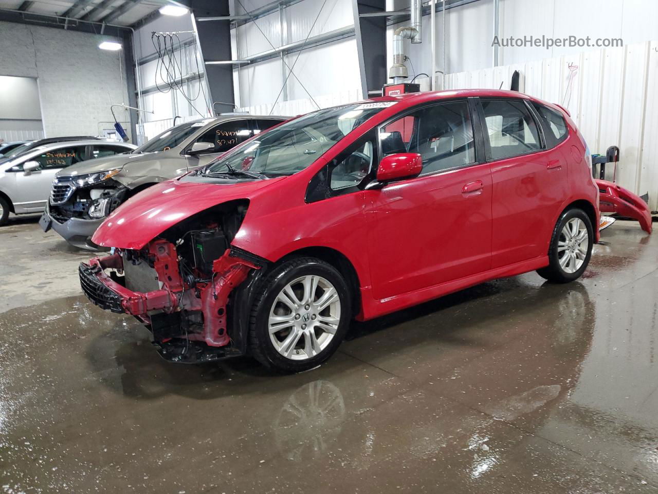 2009 Honda Fit Sport Red vin: JHMGE884X9C000782