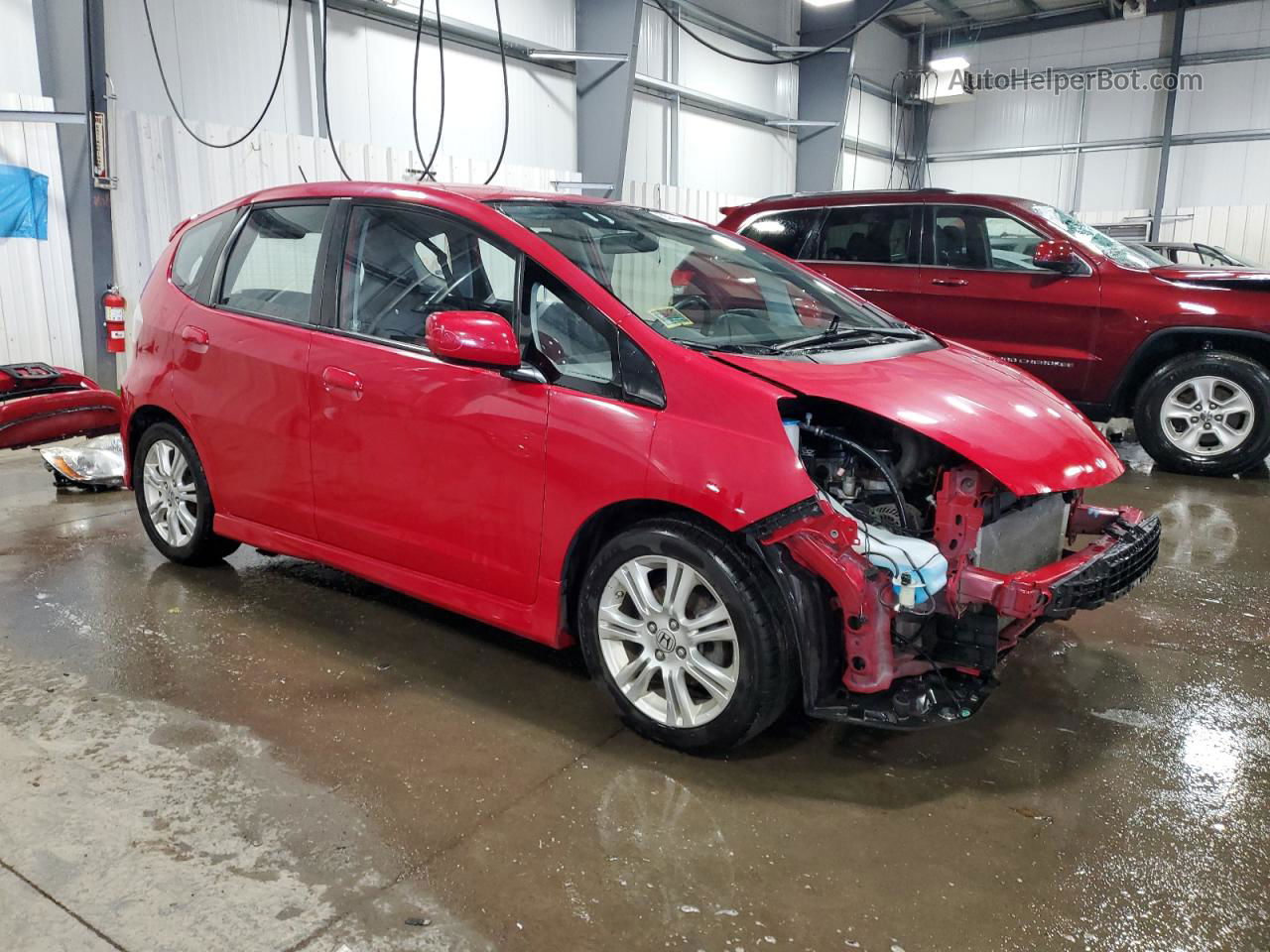 2009 Honda Fit Sport Red vin: JHMGE884X9C000782