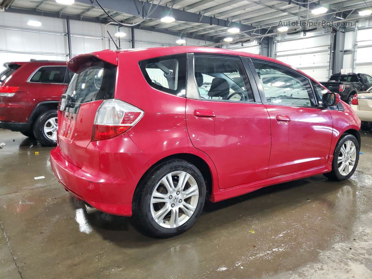 2009 Honda Fit Sport Red vin: JHMGE884X9C000782