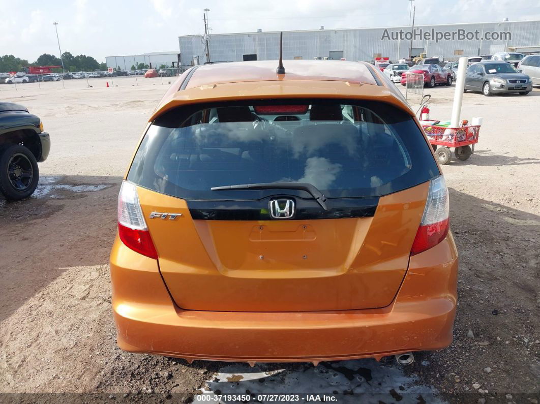 2009 Honda Fit Sport Orange vin: JHMGE884X9S041547