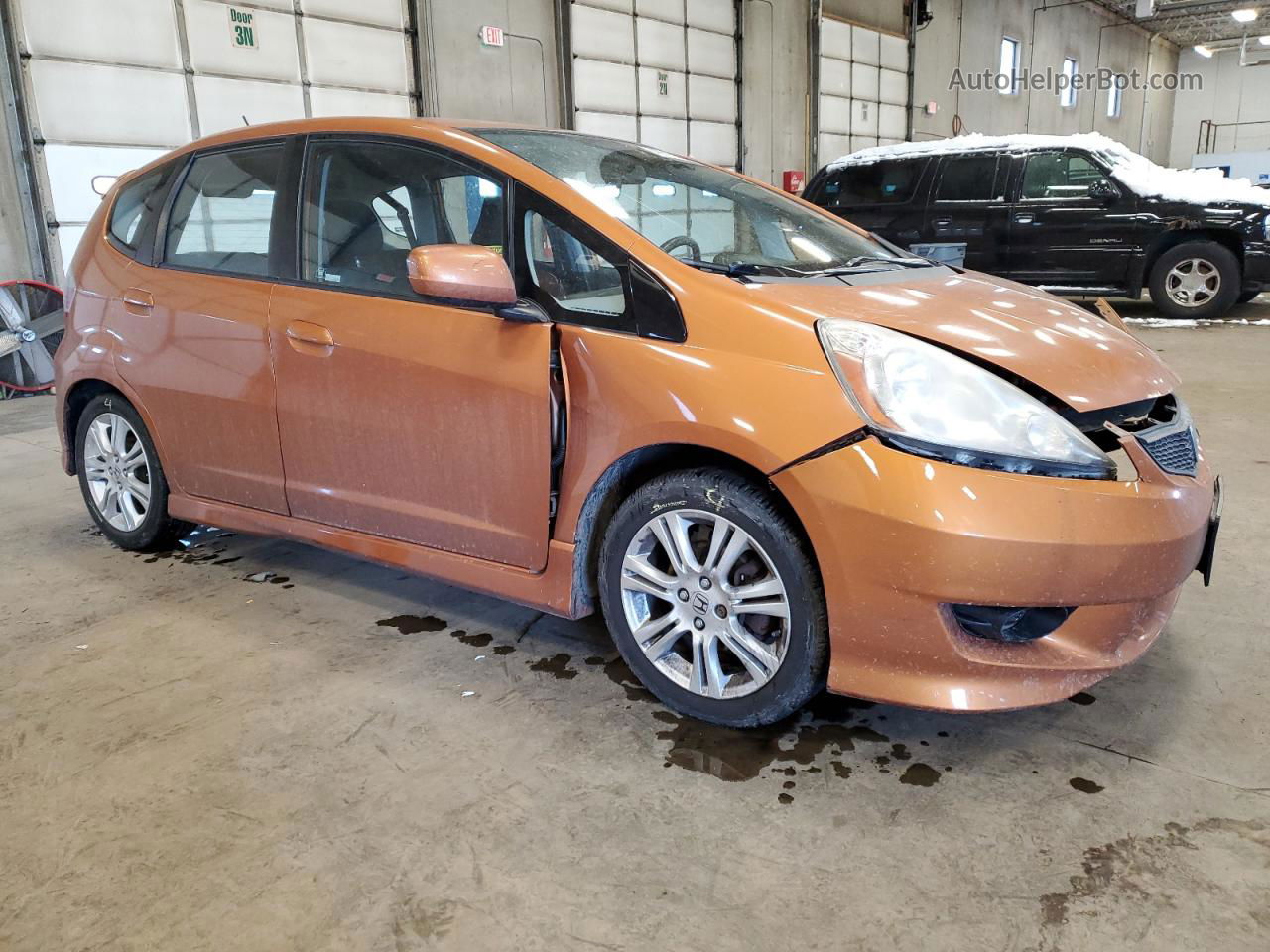 2009 Honda Fit Sport Orange vin: JHMGE884X9S050801