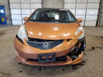 2009 Honda Fit Sport Orange vin: JHMGE884X9S050801