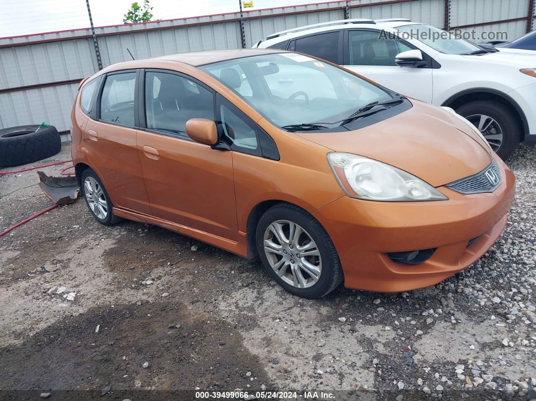 2009 Honda Fit Sport Orange vin: JHMGE884X9S075357