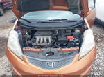 2009 Honda Fit Sport Orange vin: JHMGE884X9S075357