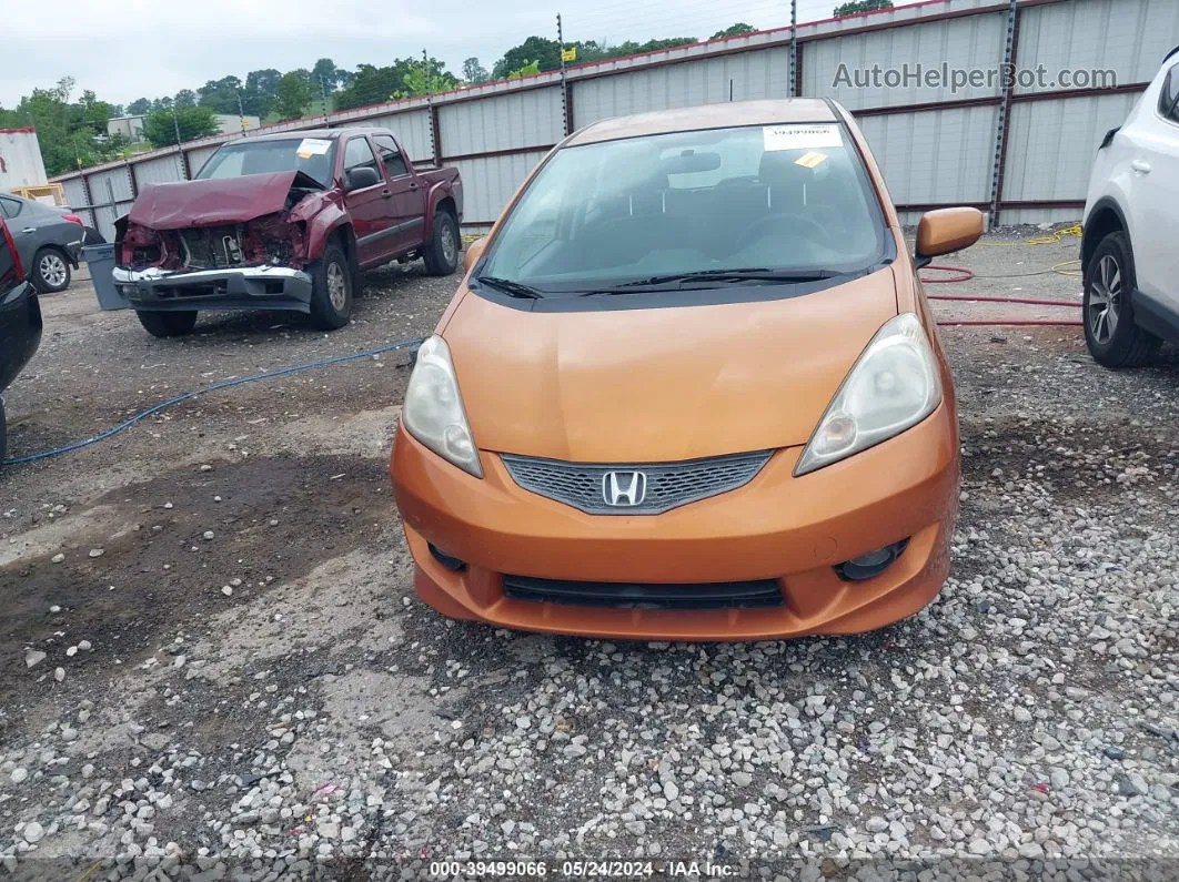 2009 Honda Fit Sport Orange vin: JHMGE884X9S075357