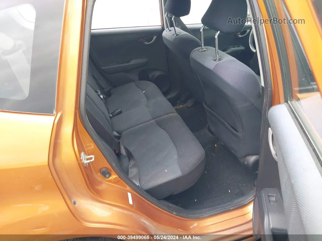 2009 Honda Fit Sport Orange vin: JHMGE884X9S075357