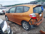 2009 Honda Fit Sport Orange vin: JHMGE884X9S075357