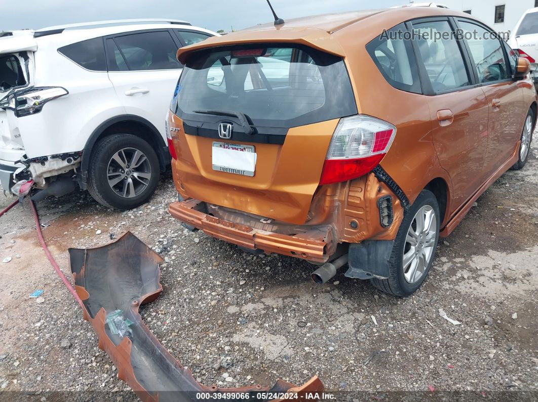 2009 Honda Fit Sport Orange vin: JHMGE884X9S075357